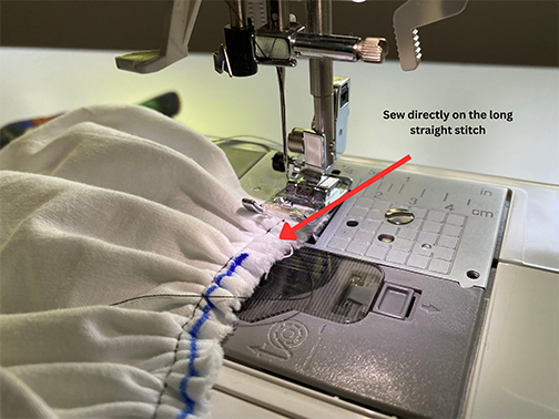 Sew directly onto the long straight stitch of the ruffle 